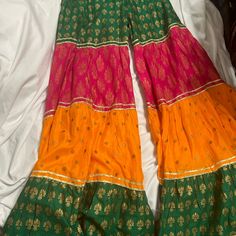 Sharara Ghagra Extra Wide Bottom Trousers In Bright Multi Color, Green, Orange And Pink, Indian Pakistani Wear, This Can Be Paired With Any White Or Black Plain Kurta Kameez Top. Indian Pakistani Traditional Wear Shalwar Kameez. This Listing Is For Trousers Only. Gold Gotta Lace Details Around The Seam. Approximate Size Shown In Picture, It's More Likely To Fit Size Xs- S. If Need More Measurements Please Let Me Know, This Is New Without Tag, Never Worn. Material Is Soft Cotton With Block Print Purple Anarkali, Mirror Work Dress, Pakistani Wear, Plain Kurta, Pakistani Traditional, Rose Pink Dress, Top Indian, Eid Dresses, Black Plain