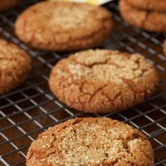 cookies cooling on a wire rack with an egg in the background