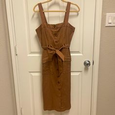 New. Size Medium. From Nordstrom Rack. Brown Colored Button Front Midi Dress. Cotton Material With Light Stretch. Removable Waist Tie With Belt Loops. Front Pockets. No Trades. K4-64 Brown Midi Dress, Dress Cotton, Waist Tie, Brown Color, Cotton Material, Nordstrom Rack, Clothing Brand, Midi Dress, Nordstrom