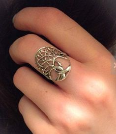 TAKE AN ADDITIONAL 20% OFF THE ALREADY REDUCED SALE PRICE - ADDITIONAL 20% IS DEDUCTED AT CHECKOUT with code SAVE20 Solid Sterling Silver - A unique design combining the traditional elements of a tree of life in an oval design - beautiful highly polished sterling silver. This is a larger Tree of Life ring where the ring face is 1" high. Choose from sizes 4-10 Moonstone Engagement Ring Set, Tree Of Life Ring, Ring Selfie, Family Ring, Life Ring, Celtic Ring, Tree Ring, Family Rings, Ring Tattoos