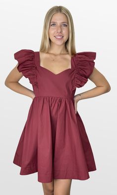 Definitely the plan. This color-match babydoll dress mixes trend and comfort. The fitted lined bodice has an open back that double ties for the perfect fit. The shoulder ruffle sleeves are just the right touch with a full skirt that gives plenty of movement and comfort. Look your best on Gameday! Color- Burgundy (Also Available in Crimson, Navy, and Purple) 100% Cotton Lining- 100% Polyester Ruffle Shoulder Dress, Game Dresses, Red Green Yellow, Black Party, Ruffle Sleeves, The Plan, Look Your Best, Romper Pants, Short Rompers