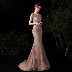 Backless Mermaid Dress With Sweep Train, Elegant Backless Mermaid Evening Dress, Embellished Fitted Mermaid Dress For Prom, Elegant Evening Wedding Dress With Mermaid Hem, Backless Mermaid Evening Dress For Prom, Elegant Fitted Mermaid Wedding Dress, Elegant Fitted Mermaid Hem Wedding Dress, Elegant Backless Bridesmaid Dress For Prom Season, Gala Evening Gown With Mermaid Hem