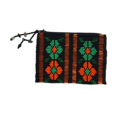 Beautifully hand-loomed of solid Czech seed beads, this charming coin purse makes a great gift. Each coin purse is fabric-lined with a zipper closing. The coin purses are hand-loomed by artisans in Guatemala and imported with Fair Trade practices. Perfect for holding ID/Credit Cards.* 4.5 in x 3 in x 0.25 in* Handmade in Guatemala* Made following Fair Trade guidelines Traditional Beaded Pouch Clutch, Traditional Beaded Rectangular Pouch, Bohemian Woven Pouch For Gift, Multicolor Beaded Rectangular Pouch, Traditional Rectangular Coin Purse As Gift, Traditional Rectangular Coin Purse For Gift, Traditional Rectangular Coin Purse Gift, Traditional Black Pouch For Gift, Woven Pouch Clutch As Gift