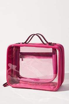 This clear cosmetic case is made for all your self-care and beauty needs. Designed with two spacious and clear compartments, you won’t forget a thing because it’s clearly all there for you to see. Plus, a top handle makes this a go-to beauty bag for travel that flattens to fit perfectly in your luggage or duffel bag. | Large Clear Cosmetics Case by CALPAK in Pink at Anthropologie Calpak Makeup Bag, Calpak Cosmetic Case, Clear Cosmetic Case, 2025 Wishlist, Wellness Home, Pr Kit, Must Have Products, Clear Cosmetic Bag, Huda Beauty Makeup