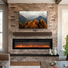 a living room filled with furniture and a fire place in front of a flat screen tv