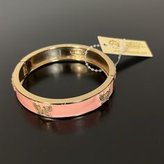 Amrita Singh Bangle, Nwt Peach/Pink Enamel With Goldtone Butterflies Hinge Closure 2.5" Diameter; .5" Width Chic Pink Bracelets For Party, Elegant Pink Bracelets For Spring, Pink Bracelets For Spring Parties, Spring Party Pink Bracelets, Pink Elegant Bracelets For Summer, Pink Bracelets For Spring, Elegant Pink Bracelets For Summer, Butterfly Hinges, Amrita Singh