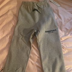 Size 8 Kids Sweats Champion Slippers Grey, Cheap Urban Gray Hoodie, Sweat Pants For Kids, Cheap Hoodie Sweats For Streetwear, Affordable Moisture-wicking Sweatpants For Streetwear, Gray Nike Sweat, Sweat Nike Collection, Essentials Hoodie And Sweatpants, Sweat Gris Nike