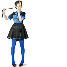 a woman in blue tights and a black dress is holding a banana up to her face