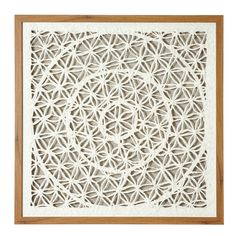 an intricate laser cut paper piece with wooden frame