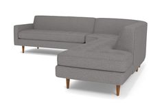 a gray couch and ottoman on a white background