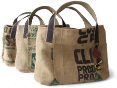 three jute bags sitting side by side on top of each other in front of a white background