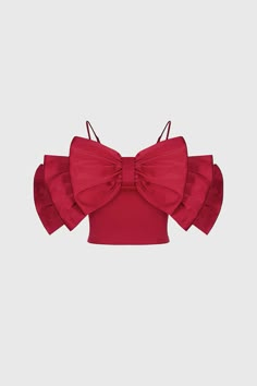 This Bow Top is perfect for formal occasions. With a large bow at the front and thin adjustable straps, it is designed to provide a slim fit that flatters your shape. Its stylish and versatile design will complete any outfit.Fabric: Cotton, Polyester Tops With Bows, Ribbon Top, Bow Aesthetic, Resort Look, Bow Top, Black Tie Gala, Swimwear Dress, Large Bow, Swimwear Cover Ups