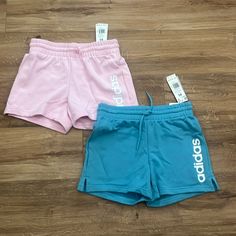 These Are Two Brand New Pairs Of Adidas Shorts! They Are Both A Size Xs With A An Adjustable Tie Around The Waist! They Are Pink And Blue And Will Be Sold Together! There Is No Liner Inside, They Are A Soft Cloth Like Shorts! Adidas Cotton Bottoms With Built-in Shorts, Adidas Cotton Shorts For Loungewear, Trendy Adidas Bottoms For Summer, Adidas Cotton Shorts For Spring, Adidas Bottoms For Summer Loungewear, Adidas Loungewear Bottoms For Summer, Adidas Summer Loungewear Bottoms, Adidas Athleisure Shorts For Spring, Adidas Casual Shorts