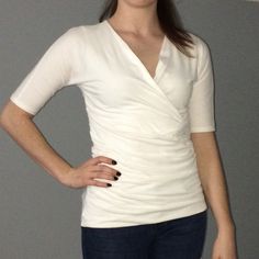 57%Cotton38%Modal%Spandex Versatile Fitted Solid Shirt, Fitted Versatile Solid Shirt, Solid Fitted Versatile Shirt, Elegant Fitted V-neck T-shirt, Fitted Versatile White Shirt, Fitted Solid V-neck Shirt, Versatile Fitted Short Sleeve Shirt, Spring Versatile Fitted T-shirt, Fitted Short Sleeve Versatile Shirt