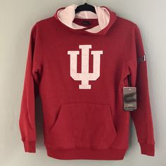 Indiana University Hoodie New With Tags Sweatshirt Red With White Iu Appliqu Sewn On Front Indiana Stitched On Left Sleeve Super Soft Colosseum Brand Youth Small 8-10 Measurements: Armpit To Armpit: 18” Length: 23” Sleeve Length From Shoulder Seam: 21” Thanks For Shopping! Please Ask All Questions Smoke Free Home. Red Team Spirit Tops For Winter, Red Long Sleeve Sweatshirt For School, Red Cotton Hoodie For School, Red College Hoodie With School Spirit Style, Red Team Spirit Hoodie With Long Sleeves, Collegiate Red Hooded Top, Collegiate Red Hoodie Top, Red Hoodie Sweatshirt For Game Day, Red Fleece Hoodie For College