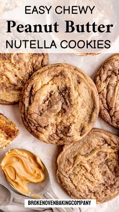 chocolate peanut butter nutella cookies on a white plate with spoon and jar of peanut butter