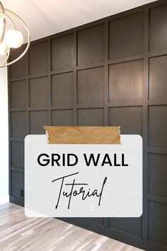 a sign that says grid wall tutorial in front of a room with dark wood paneling