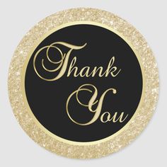 thank you sticker with gold glitter on black and white background, in the shape of a circle