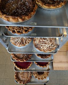 there are many pies in the display case