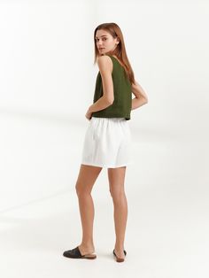 "ISLA is a high waist linen shorts. DETAILS - High waist - Elasticated waist - Side seam pockets - Oeko-Tex certified 100% lightweight linen - Cut and sewn to order just for you in our studio COLOR - White, you can also choose other colors above - Fabric samples are available here https://www.etsy.com/listing/586569696/linen-fabric-samples SIZING & FIT - Fits true to size - Inseam measures 4.92\" / 12.5 cm - Measurements taken from a size S - Model is wearing a size S - Model is 5'8.9\" / 17 Short Length Beach Tops With Pockets, Beach Tops With Pockets And Short Length, Beach Tops With Pockets, Short Style, Beach Tops With Pockets, Short Length, Short Linen Top For Beach, Short Linen Beach Top, Short Linen Top For Vacation, Short Linen Vacation Top, High Waist White Linen Shorts