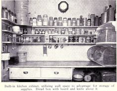 an old kitchen with lots of jars on the shelves