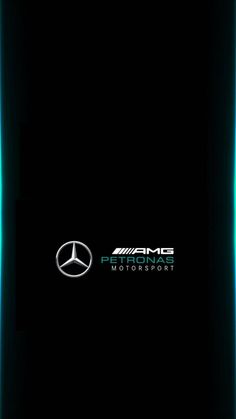 the mercedes logo is shown in this black background with blue lines and green light behind it