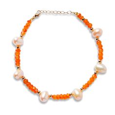 Fiery orange carnelian crystals hand strung with freshwater pearls throughout in our native New York City. This bracelet is finished with 14 karat gold. Carnelian Freshwater Pearl 14 Karat Gold 6 to 7 inches Handmade in NYC Carnelian 8mm Beads Jewelry, Gold Carnelian Jewelry With Faceted Beads, Adjustable Gold Carnelian Beaded Bracelets, Classic Carnelian Jewelry Hallmarked, Orange Hand-strung Carnelian Bracelets, Gold Bead Bracelet, Orange Carnelian, Carnelian Crystal, Carnelian Stone