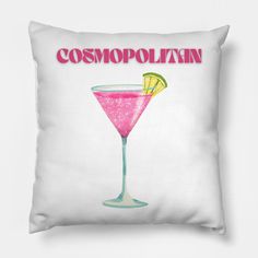 a white pillow with a pink cocktail on it and the words, cosmopolatan