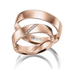 two white gold wedding bands with diamonds