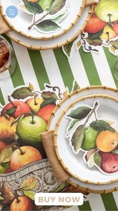 there are many plates with apples on them