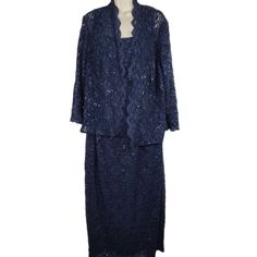 a blue dress and jacket on a mannequin headdress with lace detailing