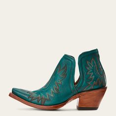 a pair of green cowboy boots with wooden heeling and an embroidered design on the side