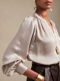 Satin Shirred-Neck Blouse | Banana Republic Factory Elegant V-neck Top With Cuffed Sleeves, Elegant V-neck Top With Button Cuffs, Chic Tops With Bishop Sleeves And Buttons, V-neck Blouse With Pleated Sleeves, Chic Split Neck Blouse For Daywear, Chic Daywear Tops With Split Neck, Elegant Button-up Blouse With Pleated Sleeves, Chic Blouse With Bishop Sleeves And Button Closure, Chic Bishop Sleeve Blouse With Button Closure