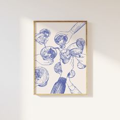 a blue and white drawing hanging on the wall