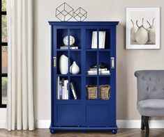 a blue bookcase in a living room