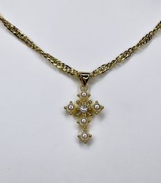 A beautiful pearl and cubic zirconia gold filled cross set on a 14k gold filled twisted rope chan. Choose a custom length between 16.5 or 17inches. Luxury Victorian Cross Necklace, Gold Cross Necklace Pearls, Luxury Ornate Cross Pendant Necklace, Vintage Gold Chain, Pearl Cross Necklace, Small Necklace, Gold Cross Pendant, Vintage Style Jewellery, 14k Gold Necklace