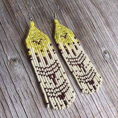 Native American earrings. These earrings measure about 4 1/4 inches with the ear wire. If you want a custom order :  contact me . Each of my creations is inspired by nature . Thank you and happy ! Traditional Fringe Beaded Earrings With Round Beads, Traditional Beaded Earrings With Fringe And Round Beads, Traditional Fringed Beaded Earrings, Yellow Fringe Beaded Earrings With Round Beads, Yellow Beaded Earrings With Fringe, Artisan Beaded Earrings With Fringe, Handwoven Yellow Beaded Earrings With Round Beads, Traditional Yellow Beaded Earrings With Tiny Beads, Traditional Yellow Handwoven Beaded Earrings