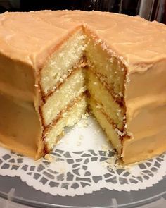 a cake with one slice cut out on a plate