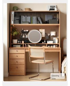 a desk with a mirror, chair and bookshelf