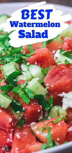 watermelon salad with feta cheese and parsley on top in a white bowl