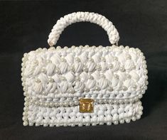 Crocheted handbag (dimensions 24cm x 16cm) with a handle, made out of cotton rope and decorated with glass beadings. Also available in listed colors. Alterations can be made if requested Handmade White Evening Shoulder Bag, Elegant White Handheld Crochet Bag, Handmade White Shoulder Bag For Party, White Shoulder Bag With Pearl Embroidery For Everyday, Handmade White Evening Bag As Gift, Handmade White Evening Bag, Handmade White Rectangular Evening Bag, Handmade White Evening Bag For Gift, White Handmade Evening Bag