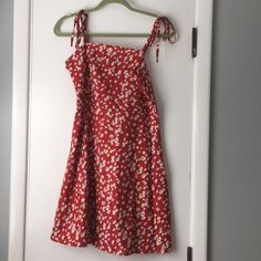 Brand New / Never Worn; Without Tags. (Shein Doesn’t Use Tags). Super Cute And Cool Sundress With Adjustable/Tie Straps. Red With Yellow/White/Blue Flowers! Zipper On Left Side. Casual Red Printed Mini Dress, Red Casual Sundress For Spring, Casual Red Sundress For Spring, Red Tie Back Mini Dress For Summer, Casual Red Printed Sundress, Casual Red Floral Print Sundress, Cute Red Sundress For Spring, Red Cotton Mini Sundress, Red Floral Print Cotton Mini Dress