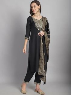 Grab this beautiful 3-piece set. The set comes with embroidery detailing kurta has round neck; 3/4th sleeves & calf length teamed with matching trouser pant and a cotton blend dupatta. Color - Black Kurta Fabric-Cotton Blend Pant Fabric-Cotton Blend Dupatta Fabric - Cotton Blend Neck-Round Neck Sleeves-3/4th Sleeves Work - Sequence Embroidery Detailing Washing Instructions-Dry Clean Model Height - 5.5 wearing size small. DISCLAIMER - The color of the product may be differ due to screen settings of device. A misprint here and a color drop slip there is the beauty of printing which is not treated as a defect. Black Kurta, Sequence Embroidery, Formal Jewelry, Embroidery Detailing, Churidar, Suit Set, Fabric Shop, Embroidery Details, Formal Wedding