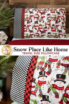 the snow place like home bedding set is shown in red, black and white