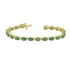 This emerald and diamond bracelet is available in 14K gold. The oval emerald in this bracelet have a total carat weight of 9.50 carats. The diamonds have a total carat weight of 0.40 carat. Green Oval Diamond Bracelet For Anniversary, Classic Green Oval Diamond Bracelet, Elegant Green Oval Diamond Bracelet, Luxury Green Oval Tennis Bracelet, Green Oval Diamond Tennis Bracelet, Oval Emerald Bracelets For Anniversary, Oval Green Diamond Bracelets, Green Oval Diamond Bracelets, Classic Green Oval Tennis Bracelet