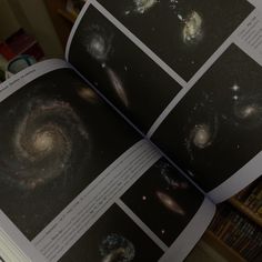 an open book with pictures of the milky in it's center and other images