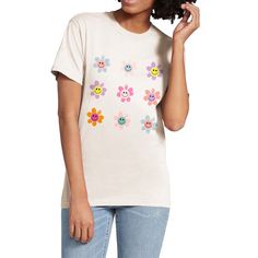 Smiley daisies remind us of the joy and delight of young children, laughing and playing in a field of flowers. Playful Spring T-shirt For Everyday, Playful Everyday T-shirt For Spring, Playful Smiley Face Tops For Spring, Cute Tie-dye T-shirt For Spring, Cute Tie Dye T-shirt For Spring, Cute Smiley Face Tops For Spring, Cute Smiley Face Top For Spring, Cute Spring Tops With Smiley Face, Tie Dye Hippie T-shirt For Spring