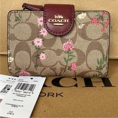 New With Tags Medium Corner Zip Wallet In Signature Canvas With Wildflower Print Signature Coated Canvas And Smooth Leather Seven Credit Card Slots Bill Compartment Id Window Snap Closure Zip Coin Pocket 5” L X 3 1/2” H X 1/2” W Style No. C8730 Offers Are Welcome Spring Bags With Card Slots, Compact Bags With Interior Card Slots, Coach Wallets As Spring Gifts, Elegant Wallets For Daily Use In Spring, Elegant Spring Wallets For Daily Use, Beige Wallets For Spring, Elegant Rectangular Wallet For Spring, Elegant Rectangular Spring Wallet, Coach Floral Wallet