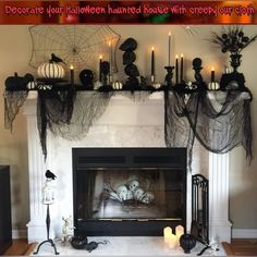 a fireplace decorated with halloween decorations and candles