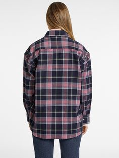 An oversized button-up shirt with dual front pockets features an elongated silhouette with a baggier, boyfriend look. Classic Oversized Button-up Flannel Shirt, Oversized Classic Fall Flannel Shirt, Casual Collared Flannel Shirt For Work, Spring Casual Workwear Flannel Shirt, Spring Casual Flannel Workwear Shirt, Spring Casual Flannel Work Shirt, Trendy Relaxed Fit Flannel Shirt For Work, Casual Flannel Shirt With Pockets For Gatherings, Trendy Fall Shirt With Pockets